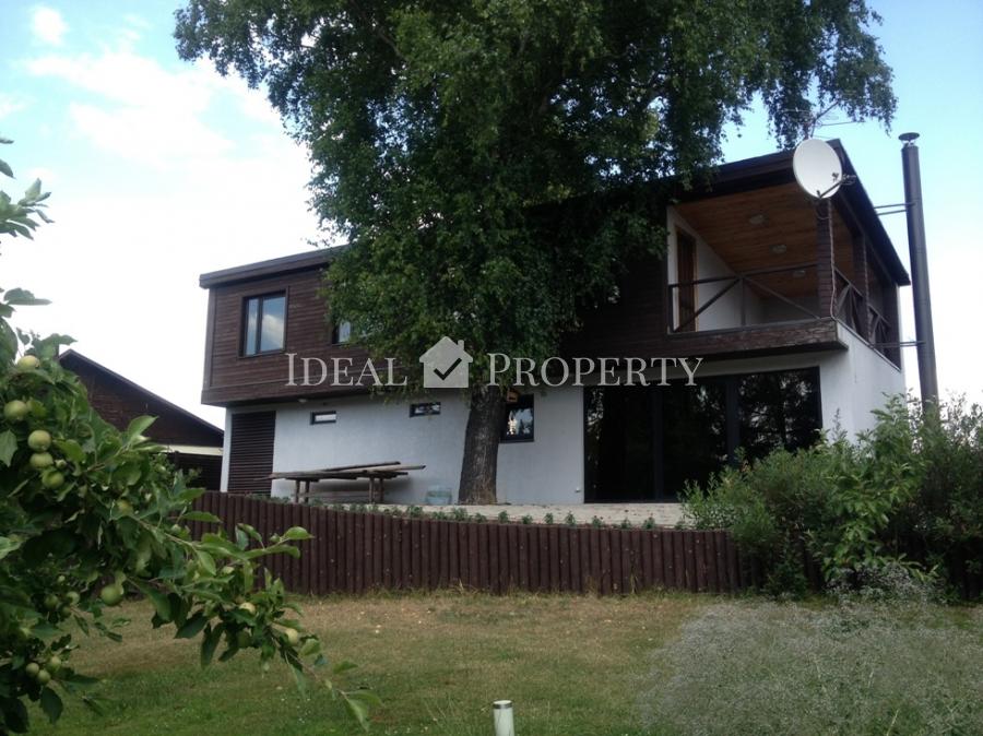 An exclusive spacious family house situated on the shore of beautiful lake