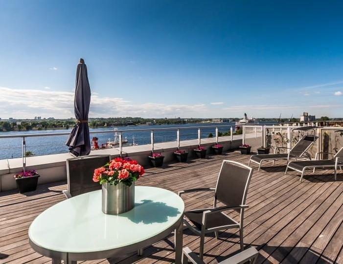 Exclusive two storey penthouse with stunning Daugava River view.