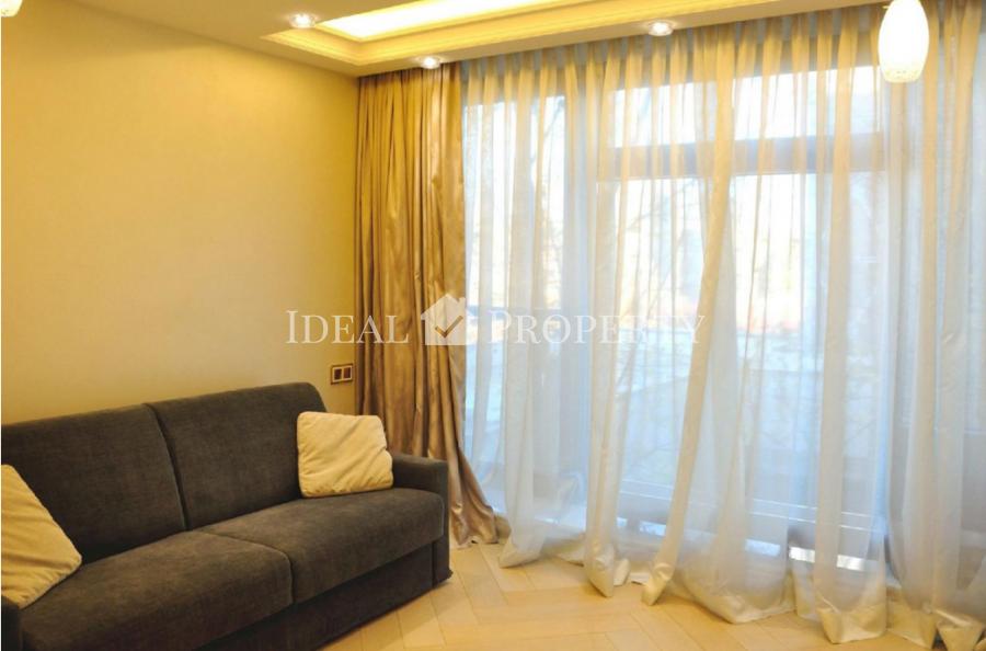 Apartment in the exclusive design building with a high-quality interior design and furniture. 