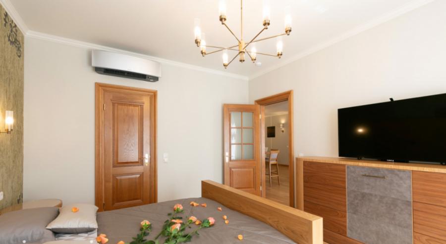 Spacious three-room apartment with high-quality renovations and exclusive finishes.