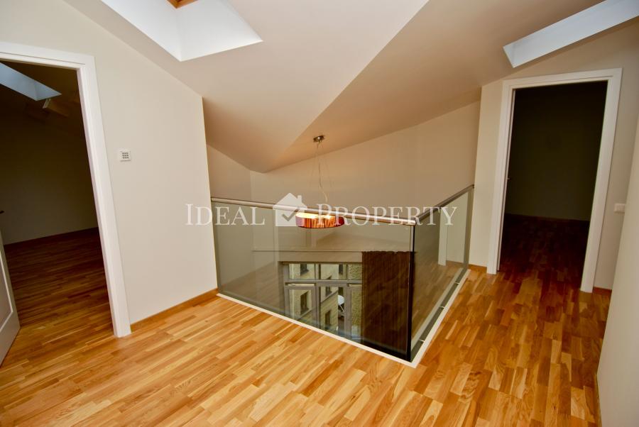 For sale modern, comfortable two-level apartment in the city center .