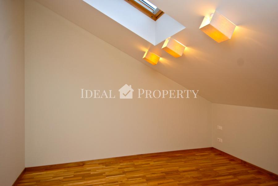 For sale modern, comfortable two-level apartment in the city center .