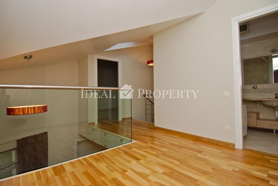 For sale modern, comfortable two-level apartment in the city center .