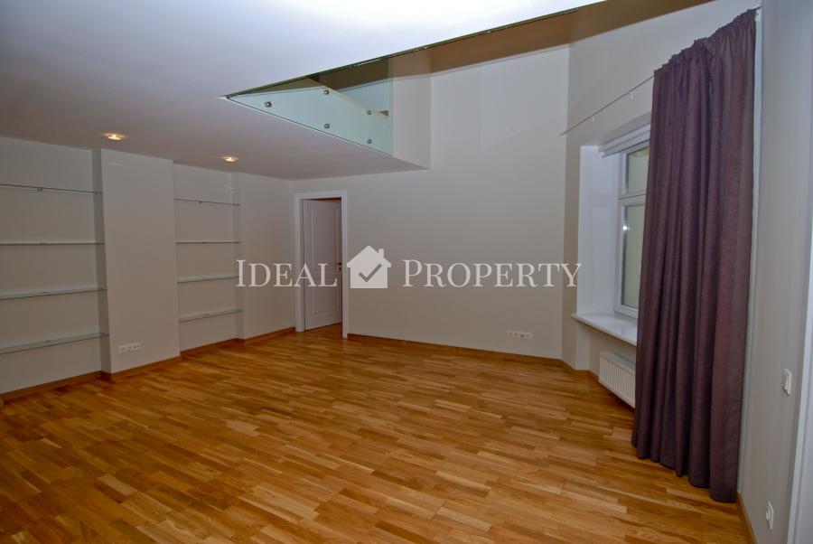 For sale modern, comfortable two-level apartment in the city center .