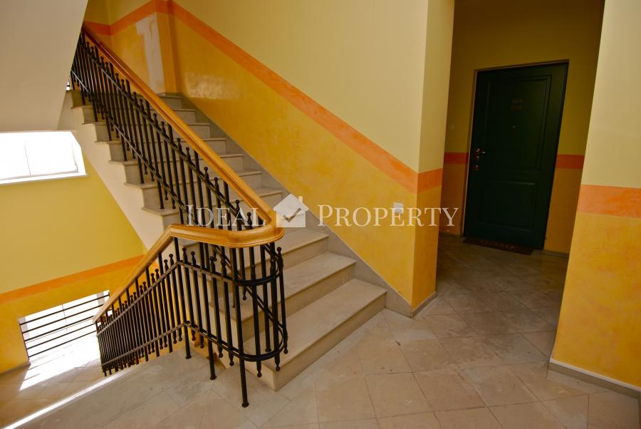 For sale modern, comfortable two-level apartment in the city center .