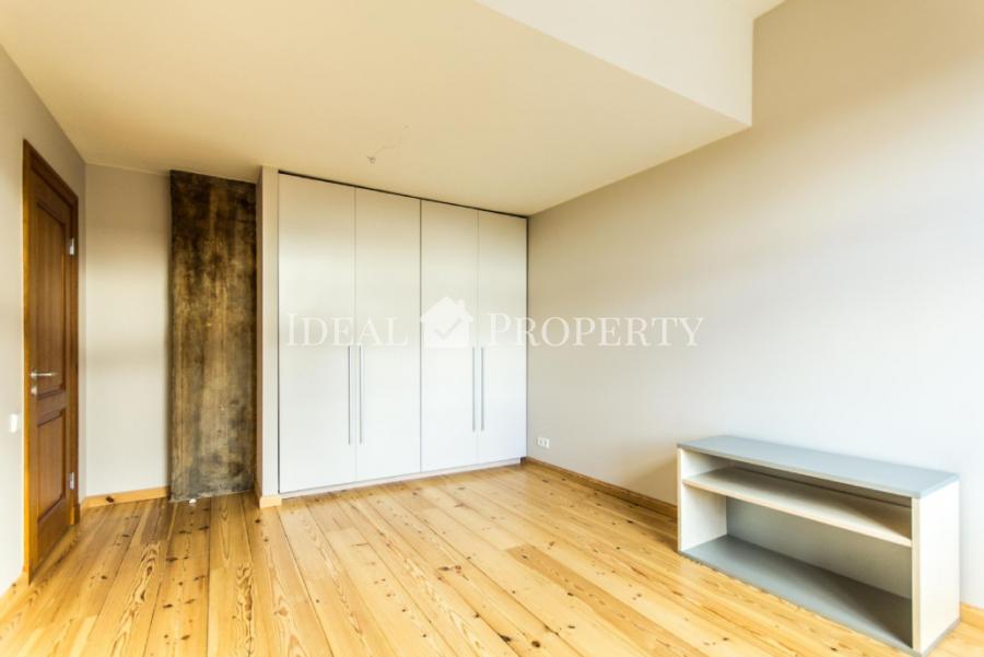 For rent 3-bedroom loft apartment with a balcony, located on a quiet street . 