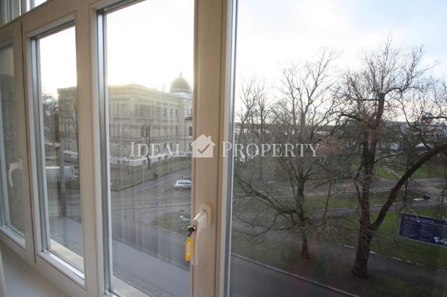 Spacious four-room apartment in Art Nouveau building.