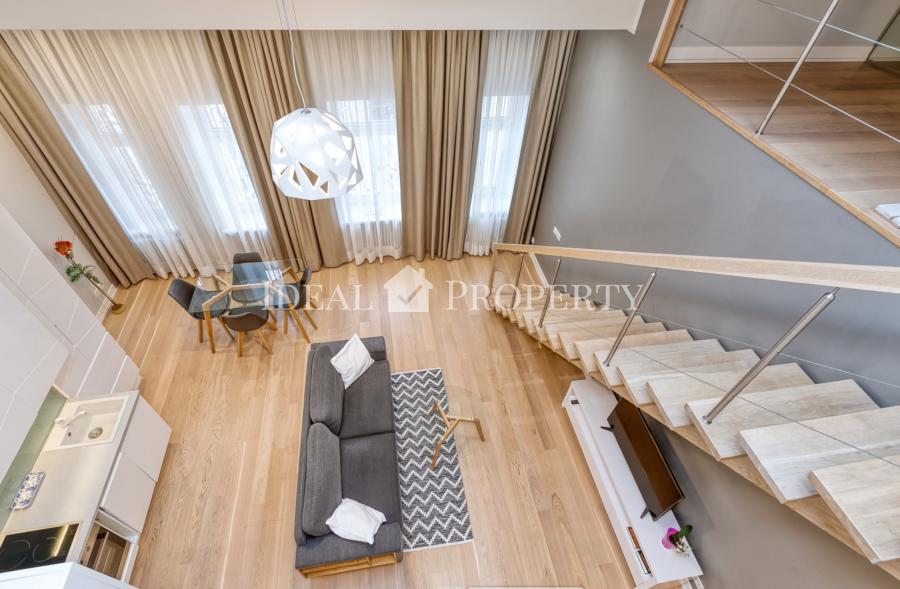 We offer for sale or rent an elegant duplex apartment in the quiet center of Riga.