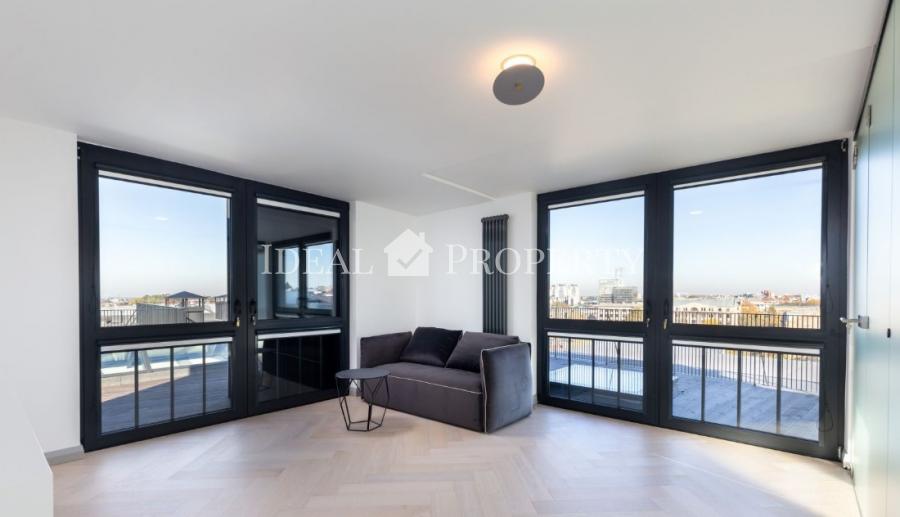 We offer for sale a designer apartment in the city center.