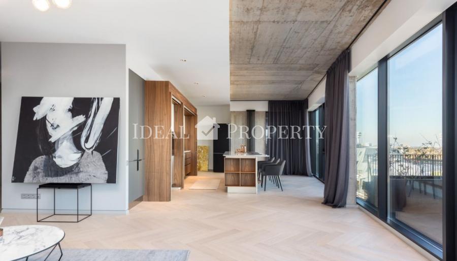 We offer for sale a designer apartment in the city center.