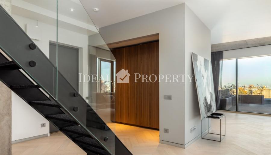 We offer for sale a designer apartment in the city center.