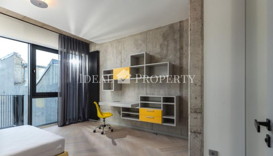 We offer for sale a designer apartment in the city center.