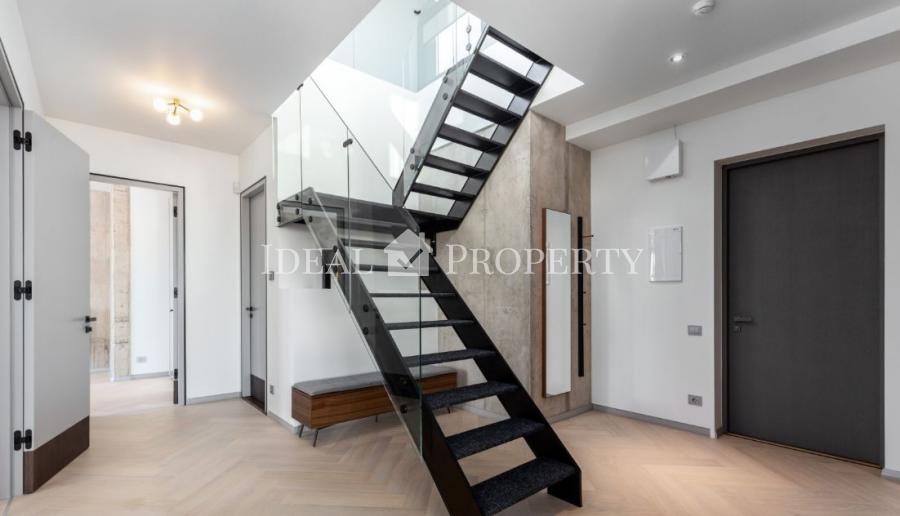 We offer for sale a designer apartment in the city center.