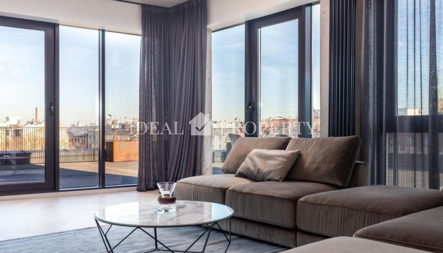 We offer for sale a designer apartment in the city center.