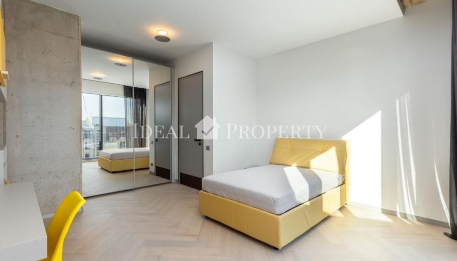 We offer for sale a designer apartment in the city center.