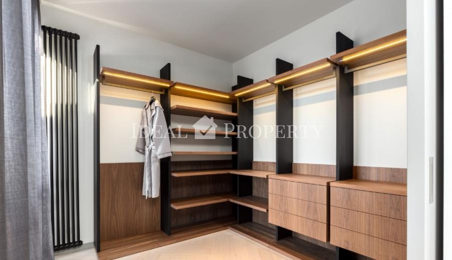 We offer for sale a designer apartment in the city center.