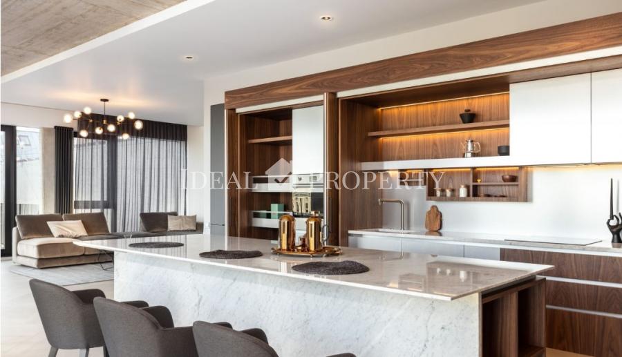 We offer for sale a designer apartment in the city center.