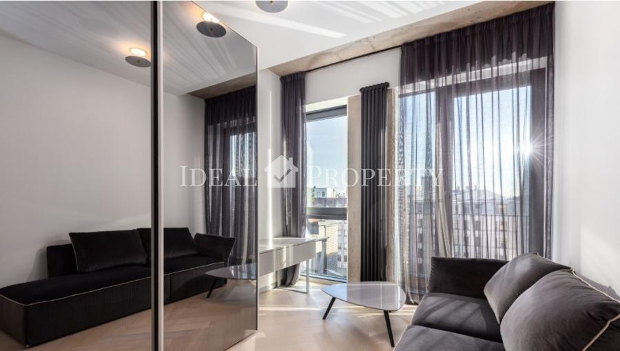 We offer for sale a designer apartment in the city center.