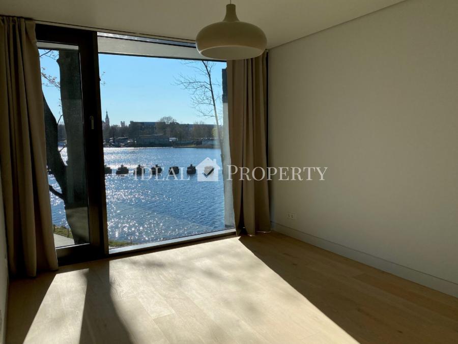 Apartment is prestigiously located on the river bank of Daugava which provides for spectacular views through big panoramic windows at Agenskalns bay and well-maintained, landscaped park.