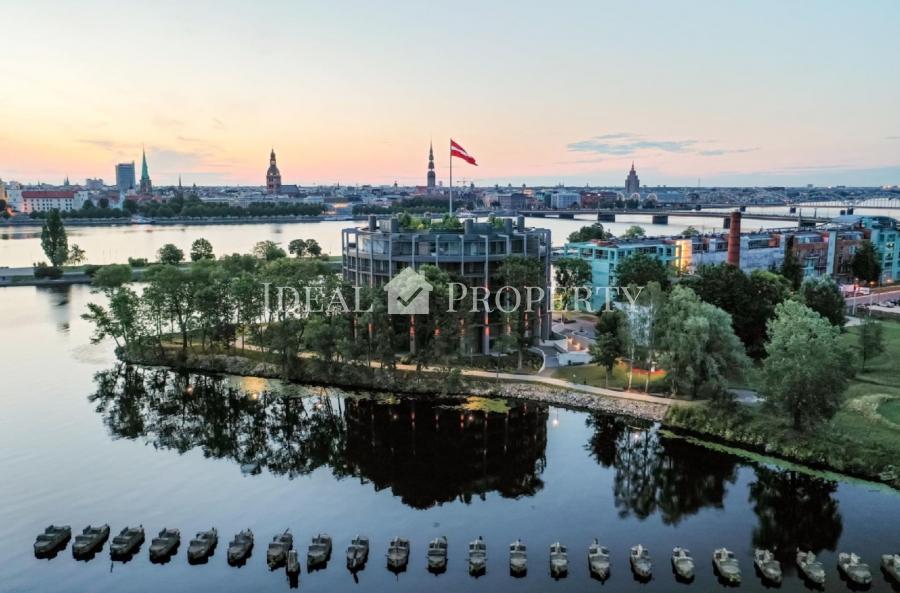 Apartment is prestigiously located on the river bank of Daugava which provides for spectacular views through big panoramic windows at Agenskalns bay and well-maintained, landscaped park.