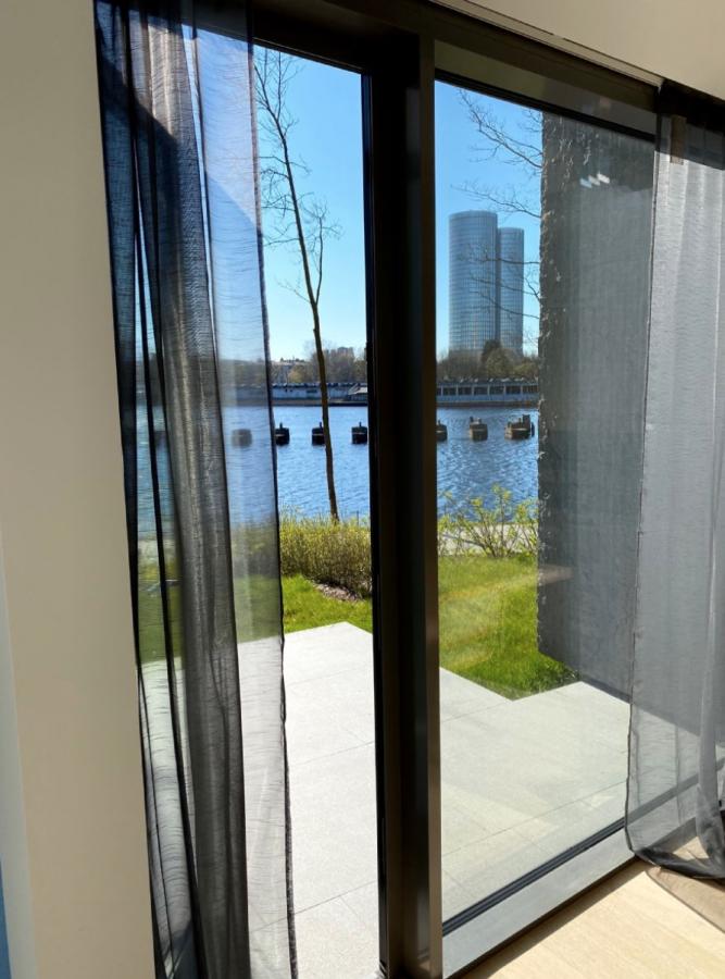 Apartment is prestigiously located on the river bank of Daugava which provides for spectacular views through big panoramic windows at Agenskalns bay and well-maintained, landscaped park.