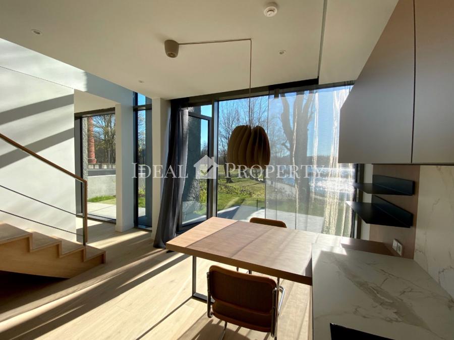 Apartment is prestigiously located on the river bank of Daugava which provides for spectacular views through big panoramic windows at Agenskalns bay and well-maintained, landscaped park.