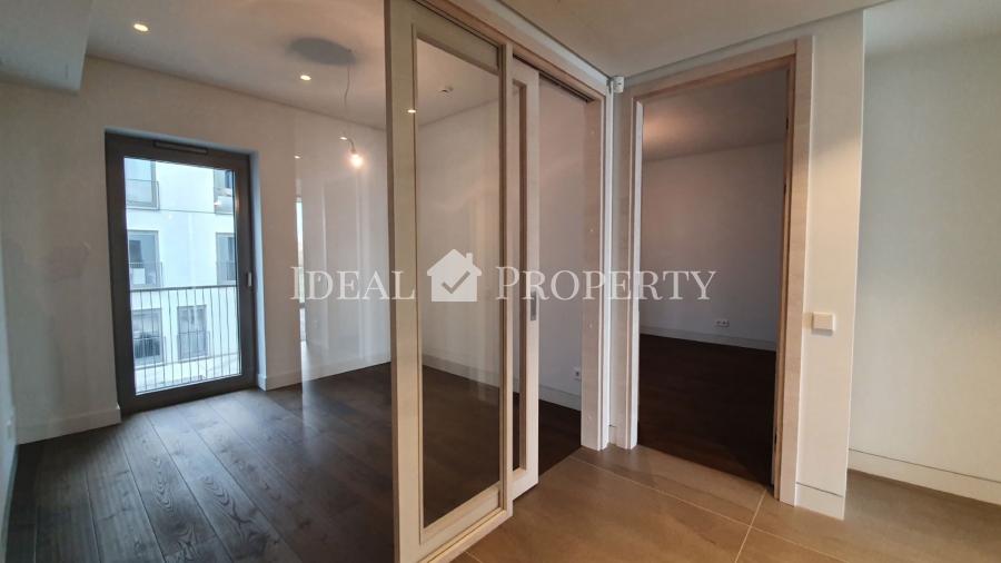 For sale a spacious apartment in a new project in the city center.