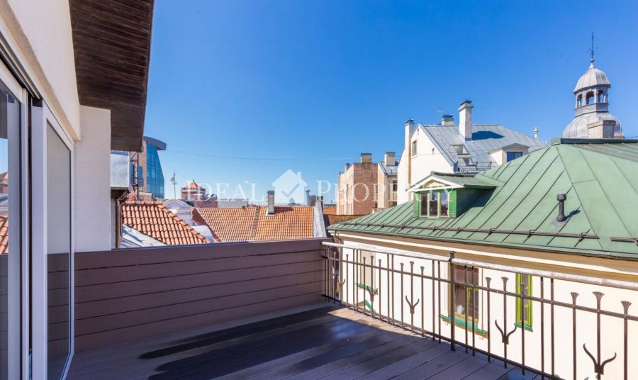 For sale an exclusive apartment with fireplace and terrace in Old town.