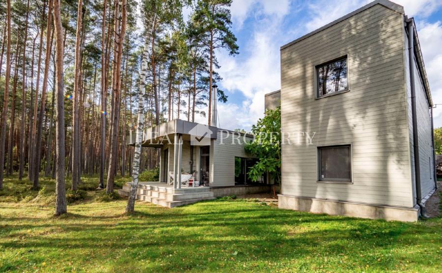 For sale / rent  is a modern house in Jurmala, with a wonderful spacious plot of land with evergreen pines.