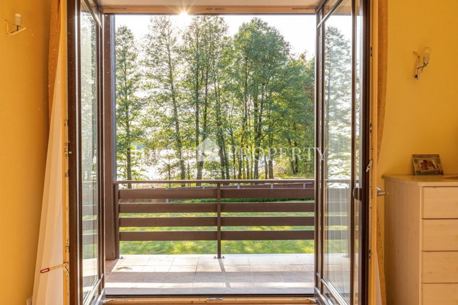 Частный дом на берегу озера Лангстини (первая линия). 