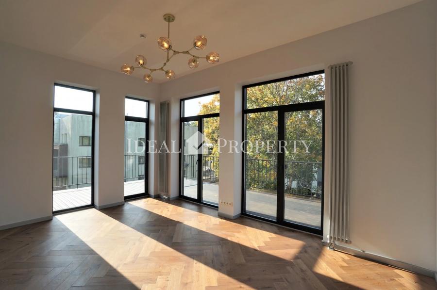 Penthouse apartment with a terrace for sale in an exclusive new building in Dzintari.