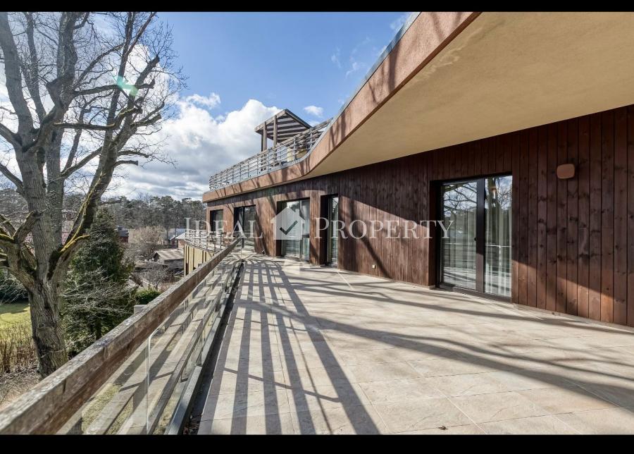 A spacious, bright and cozy penthouse on the first line from the sea in a dune zone.