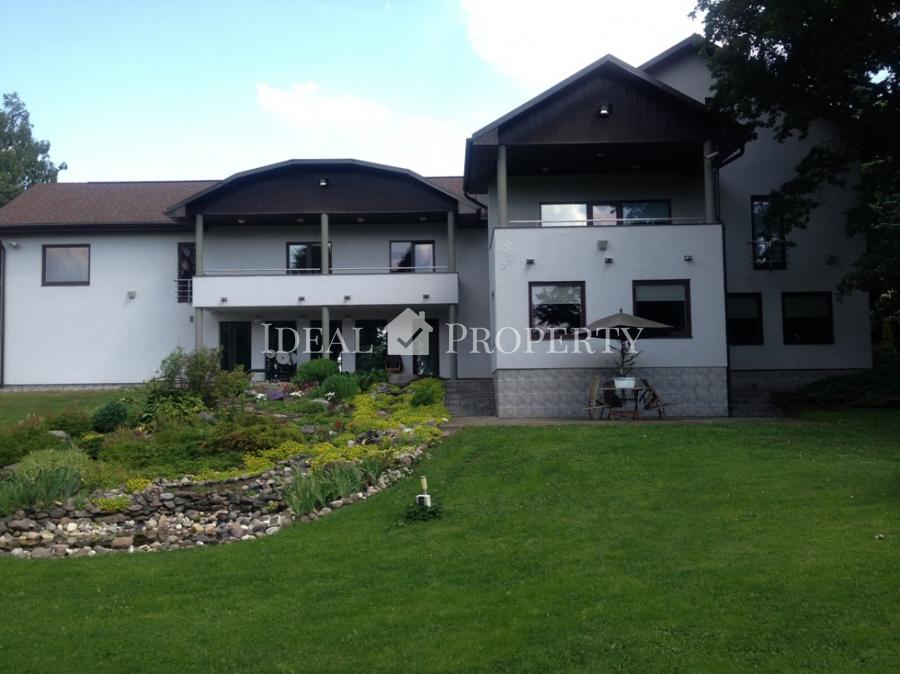 An exclusive spacious family house situated on the shore of beautiful lake