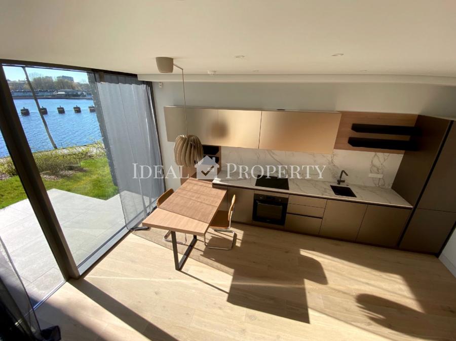 Apartment is prestigiously located on the river bank of Daugava which provides for spectacular views through big panoramic windows at Agenskalns bay and well-maintained, landscaped park.