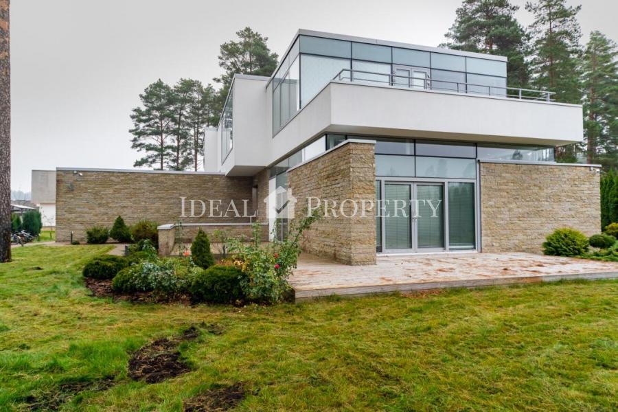 A large, beautiful house with a modern design in the elite gated  village  