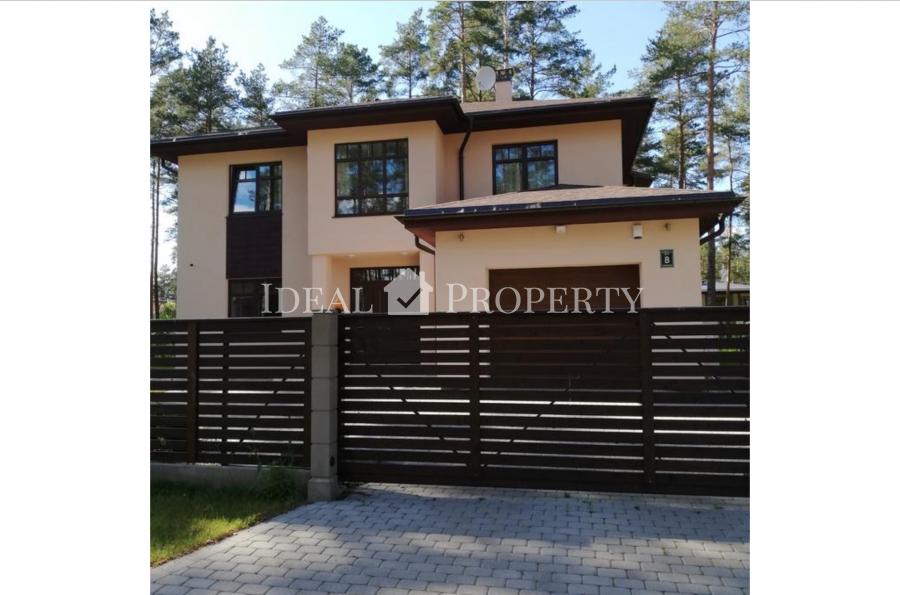 The house is located in a unique location near lake Small Baltezers in the village of Marsili in a pine forest. 